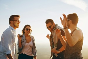 Young people talking and laughing.