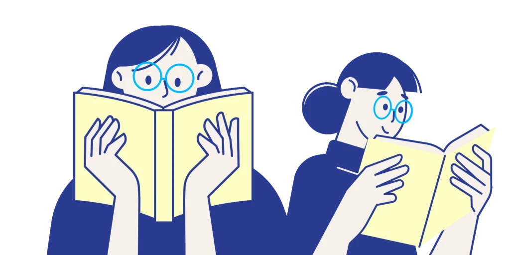 Two students studying together from books — learning vocabulary in a Spanish course for Japanese beginners.